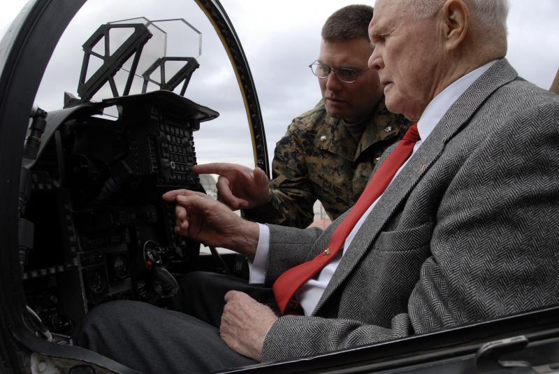 LtCol. John Cane familiarizes Sen. John Glenn with the AV-8B II+ Harrier cockpit